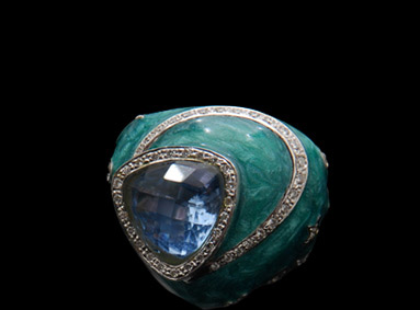 Blue Topaz surrounded by diamonds